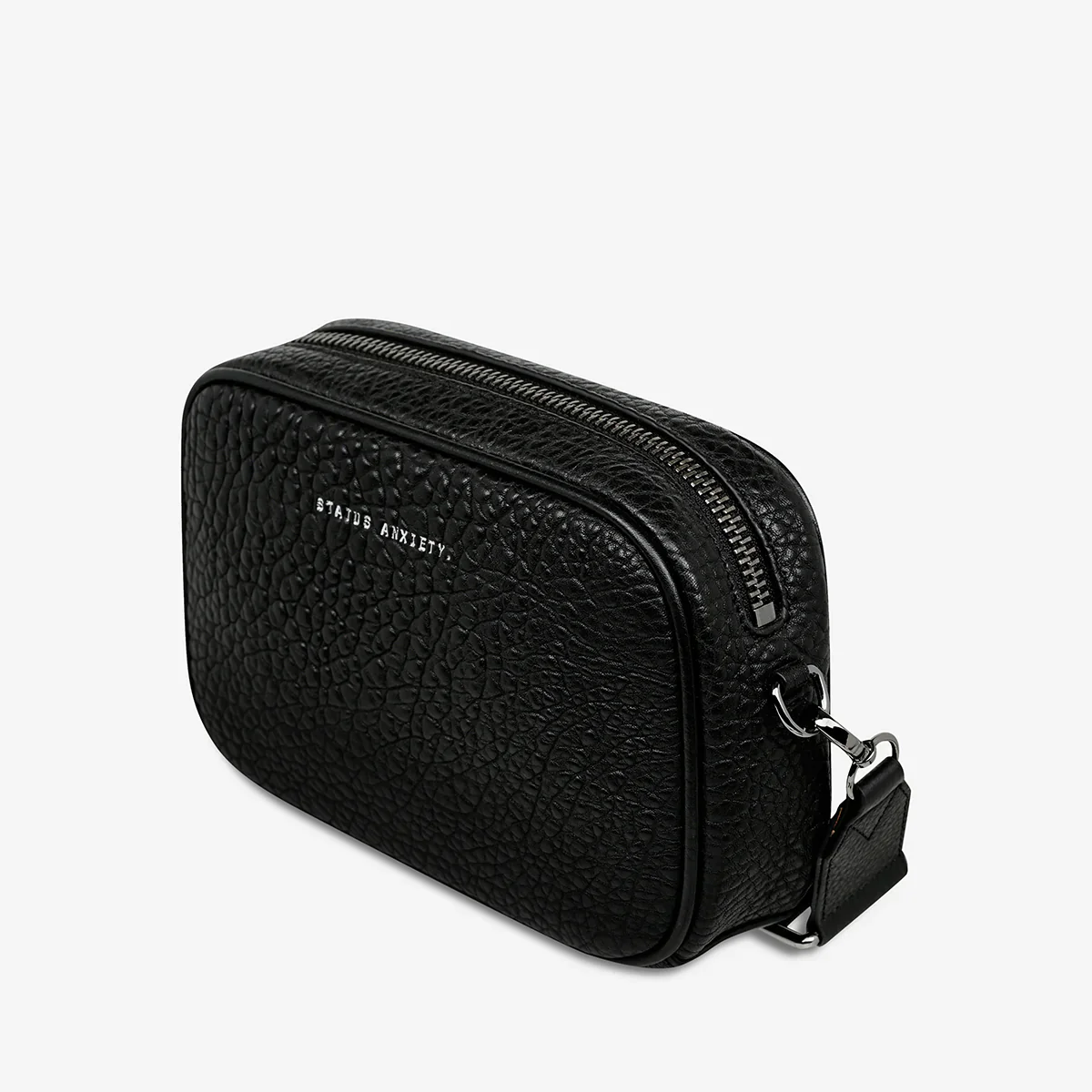 STATUS ANXIETY Womens Plunder Cross Body Leather Bag with Webbed Strap - Black Bubble Leather - Image 4
