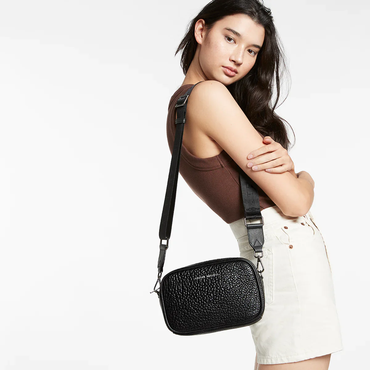 STATUS ANXIETY Womens Plunder Cross Body Leather Bag with Webbed Strap - Black Bubble Leather - Image 8